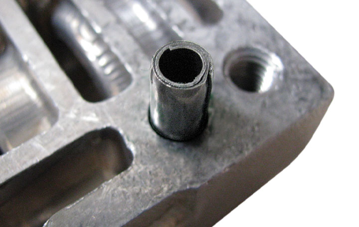 app coiled pin automotive valve body close up right